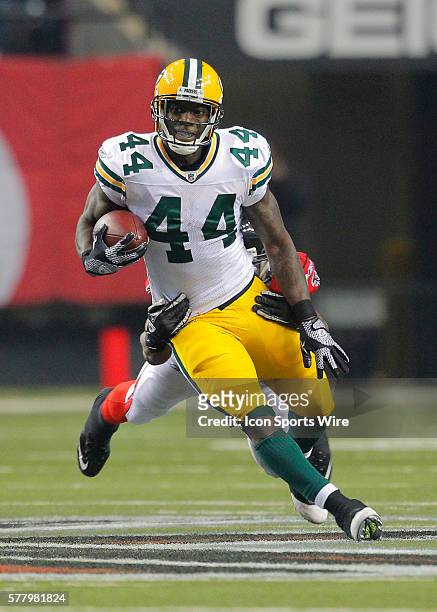 Green Bay Packers running back James Starks rushes in the Green Bay Packers 48-21 victory over the Atlanta Falcons in the NFC Divisional playoff at...