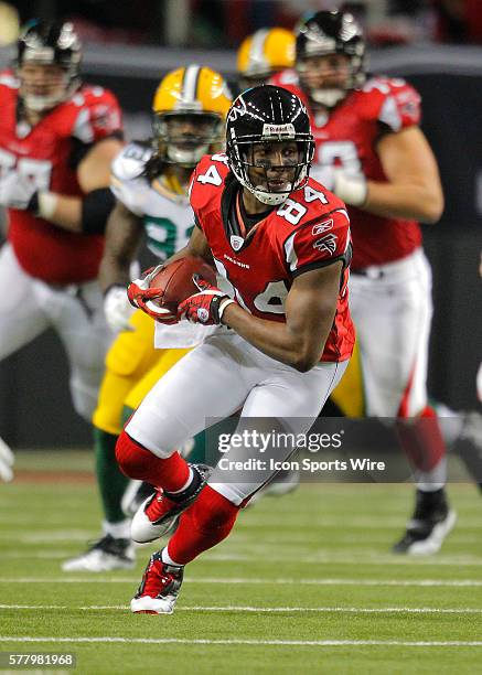 Atlanta Falcons wide receiver Roddy White turns upfield after the reception in the Green Bay Packers 48-21 victory over the Atlanta Falcons in the...