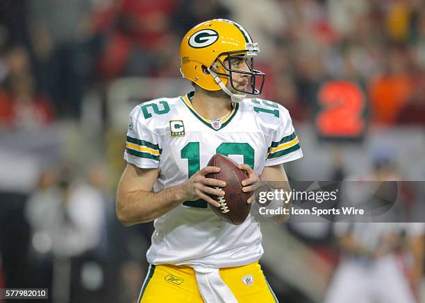 Green Bay Packers quarterback Aaron Rodgers drops back to pass in the Green Bay Packers 48-21 victory over the Atlanta Falcons in the NFC Divisional...