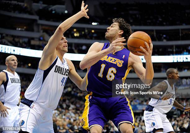 Los Angeles Lakers power forward Pau Gasol is guarded in the post by Dallas Mavericks power forward Dirk Nowitzki finished with 21 points in an NBA...