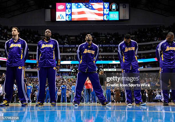 Los Angeles Lakers shooting guard Kobe Bryant and Lakers team mates observe the National Anthem before an NBA game between the Los Angeles Lakers and...