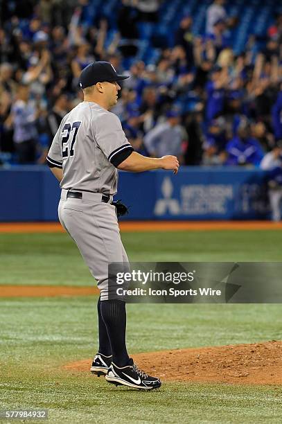 New York Yankees pitcher Shawn Kelley reacts after he is hit for a triple. The New York Yankees defeated the Toronto Blue Jays 6 - 4 at the Rogers...