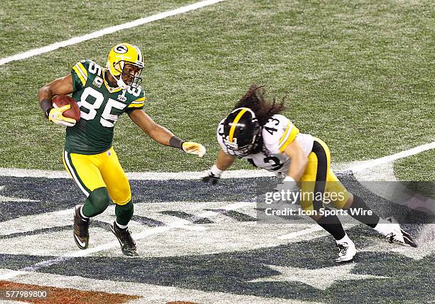 Green Bay Packers WR Greg Jennings we a reception late in the 4th quarter during the Pittsburgh Steelers game versus the Green Bay Packers in Super...