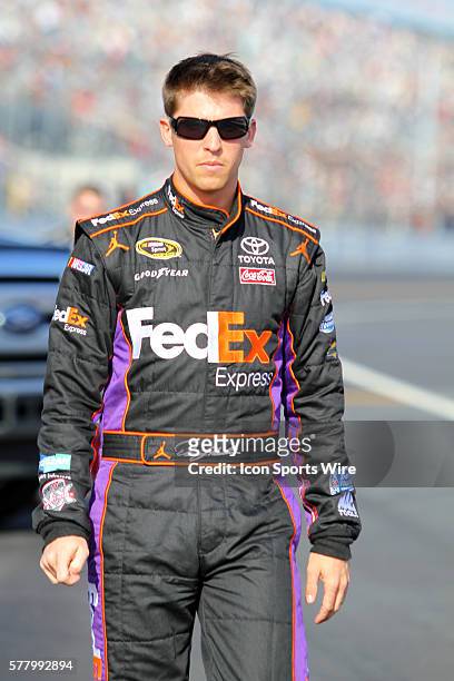 Denny Hamlin the driver of the number 11 FedEx Express car on pit road during the second race of the Sprint Cup Series Gatorade Duels held at the...