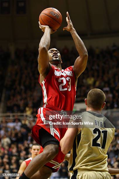 Ohio State guard David Lighty goes up for the shot while being guarded by Purdue guard D.J. Byrd during the Purdue Boilermakers 76 - 63 victory over...