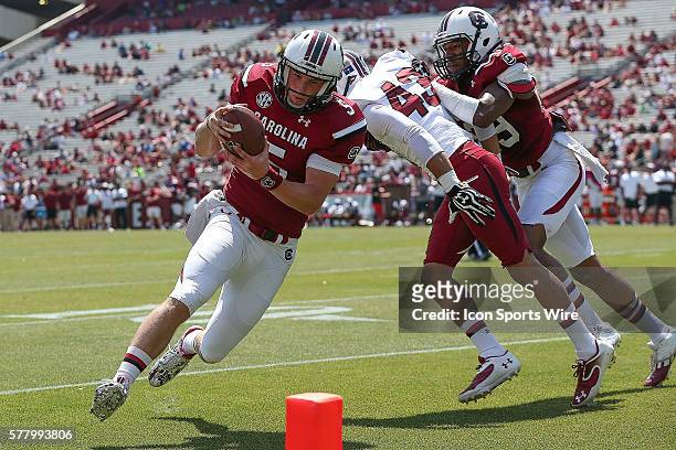 Quarterback Brandon Nasovitch sprints towards the end zone during the spring practice game held at Williams-Brice Stadium, in Columbia, South...