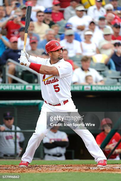 St. Louis Cardinals Infielder Albert Pujols bats during an MLB spring training game in which the St. Louis Cardinals defeated the New York Mets 3-2...