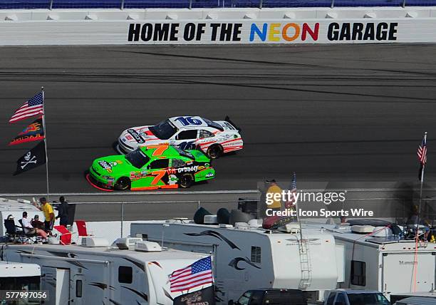 Danica Patrick Go Daddy Chevrolet Imapla SS passes Trevor Bayne Roush Racing Ford Mustang during the NASCAR Nationwide Series Sam's Town 300 at the...