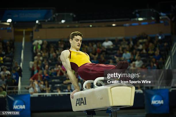 April 12, 2014 - Ann Arbor, MI Ellis Mannon of Minnesota performs on the pommel horse during the 2014 NCAA Men's Gymnastics Championships Event...