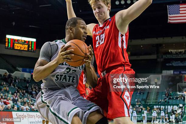 Cleveland State Vikings F Demonte Flannigan is defended by Youngstown State Penguins F Bobby Hain during the game between the Youngstown State...