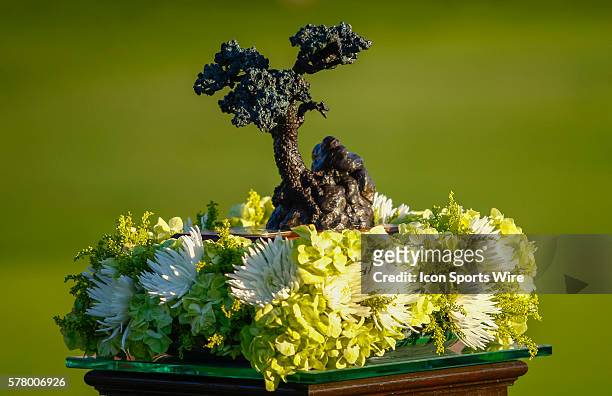 The trophy sits atop a podium waiting to be awarded to Jason Day on the Torrey Pines Golf Course during the final round of the Farmers Insurance Open...