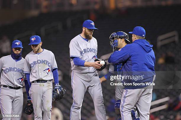 April 17, 2014 Toronto Blue Jays manager John Gibbons gets the ball from Toronto Blue Jays pitcher Steve Delabar during eighth inning at the...