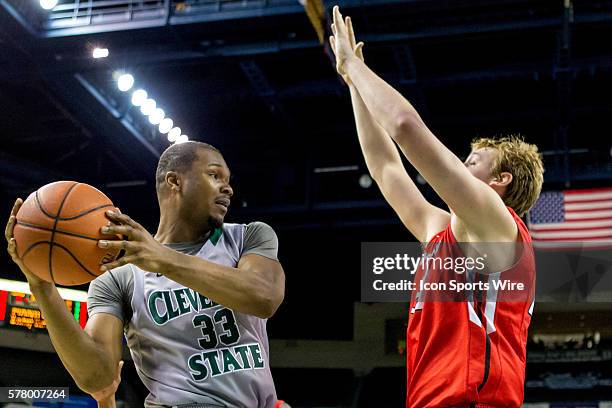 Cleveland State Vikings F Demonte Flannigan is defended by Youngstown State Penguins F Bobby Hain during the game between the Youngstown State...