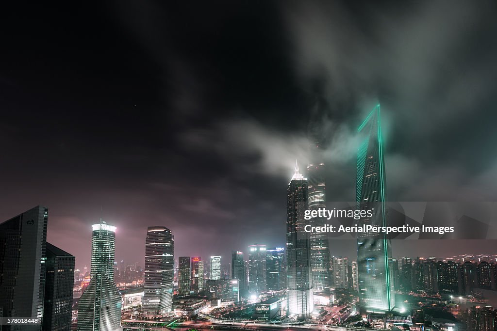 Illuminated Skyscrapers in Shanghai at night