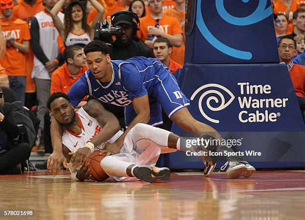 Duke Blue Devils center Jahlil Okafor tries to get the ball from Syracuse Orange forward Rakeem Christmas during ncaa basketball game between Duke...