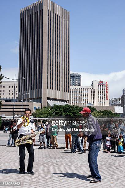 South Africa, Cape Town, City Centre, Adderley Street, Navy Band musicians playing free concert downtown skyline.