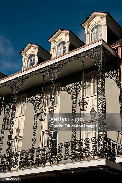 Balcony and dormer windows of a classic house in New Orleans, Louisiana.