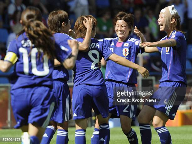 Germany - Japan players celebrate after Aya Miyama scored a free kick in the team's second goal in a Women's World Cup game against New Zealand in...