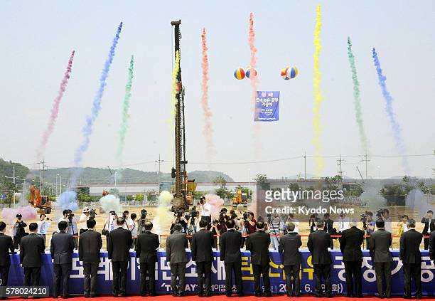 South Korea - A ground-breaking ceremony is held at a carbon fiber factory in Gumi in North Gyeongsang Province on June 28, 2011. Toray Advanced...