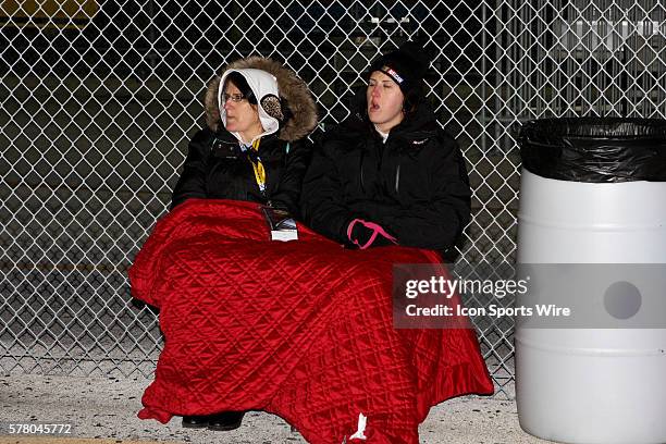 The fans brave the cold as the temperature was in the 30's at the NASCAR Sprint Cup Series Budweiser Duel race at Daytona International Speedway in...