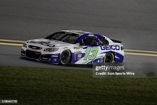 Casey Mears blows an engine during the running of the NASCAR Sprint Cup Series Budweiser Duel race at Daytona International Speedway in Daytona,...