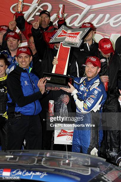 Dale Earnhardt Jr. Celebrates winning the NASCAR Sprint Cup Series Budweiser Duel race at Daytona International Speedway in Daytona, Florida