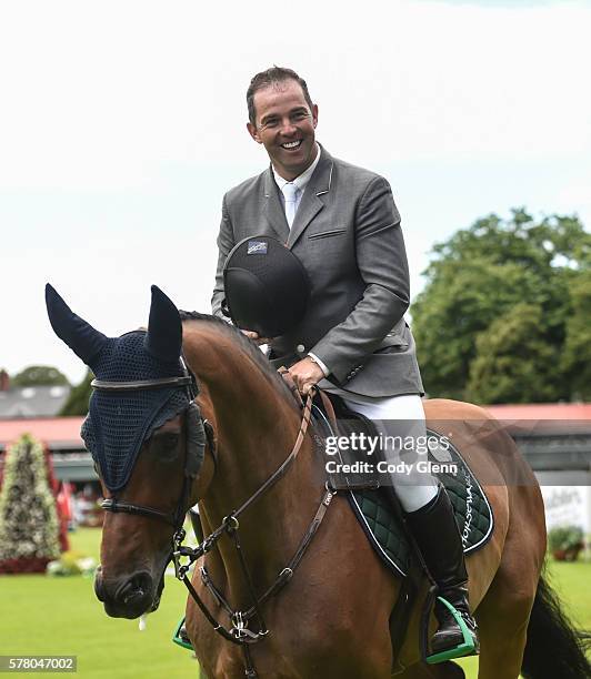 Dublin , Ireland - 20 July 2016; Cian O'Connor, Ireland, takes a lap of honour on Aramis 573 after winning the Speed Stakes at the Dublin Horse Show...