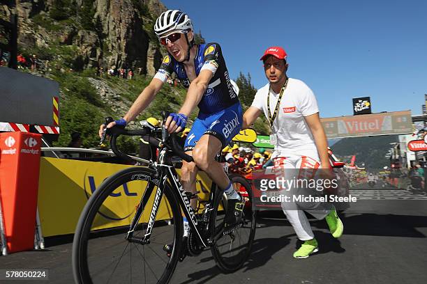 Daniel Martin of Ireland and Etixx-QuickStep is given a helping push after crossing the finishing line during the 184.5km stage seventeen of Le Tour...