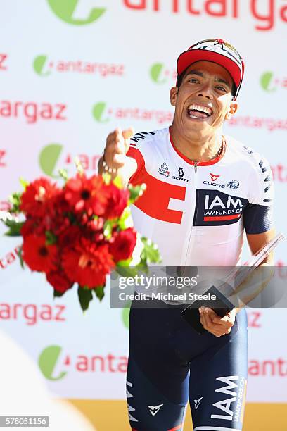 Jarlinson Pantano of Colombia and IAM Cycling celebrates receiving the most competitive rider of the stage following the 184.5km stage seventeen of...