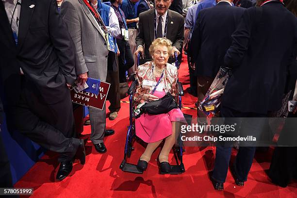 Phyllis Schlafly, president of the Eagle Forum, is wheeled across the floor during the second day of the Republican National Convention at the...