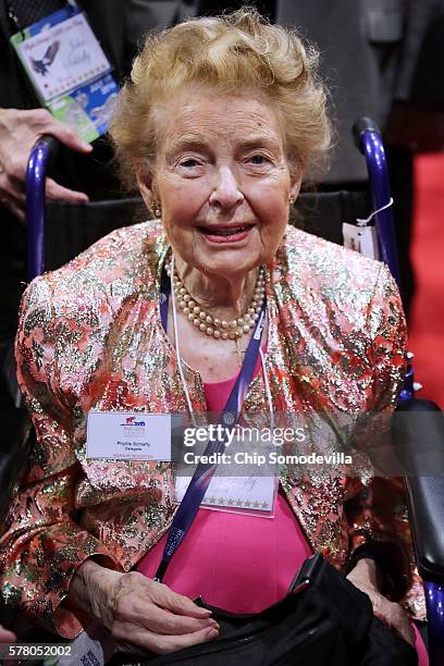 Phyllis Schlafly, president of the Eagle Forum, is wheeled across the floor during the second day of the Republican National Convention at the...