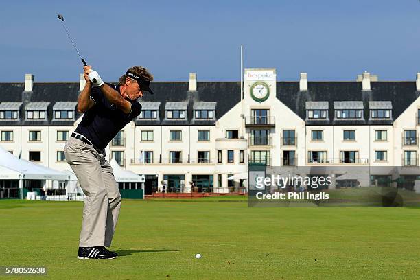Bernhard Langer of Germany plays his second shot to the 18th hole during practice for the Senior Open Championship previews played at Carnoustie on...