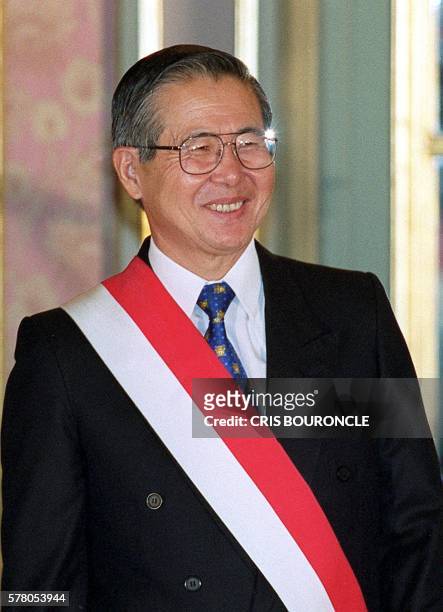 Peruvian President Alberto Fujimori smiles during the ceremony of General Fernando Dianderas's oath as a new Minister of Interior at Government...