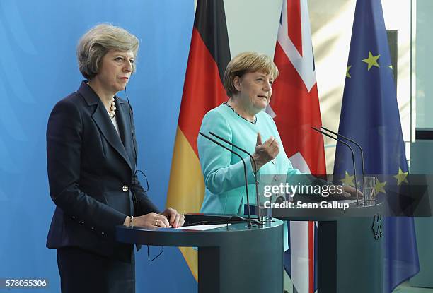 German Chancellor Angela Merkel and British Prime Minister Theresa May speak to the media following talks at the Chancellery on July 20, 2016 in...