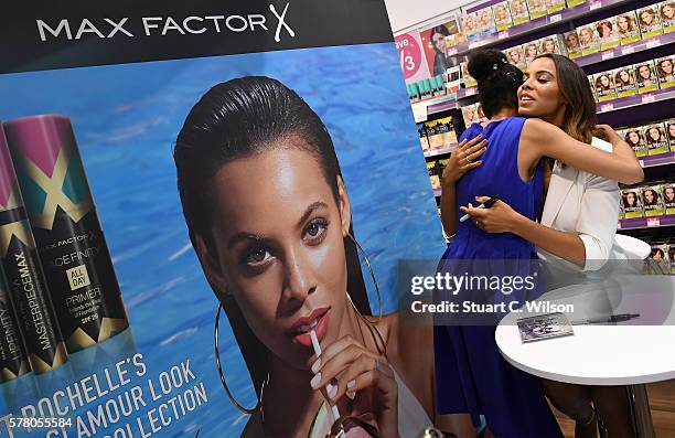 Rochelle Humes with a fan as she appears exclusively in Superdrug Lakeside for her next look with Max Factor "Pool Side Glamour" wearing her new VERY...