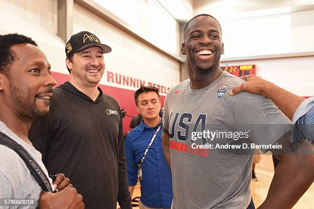 Draymond Green of the USA Men's National Team talks to Phil Hellmuth during practice on July 19, 2016 at Mendenhall Center on the University of...