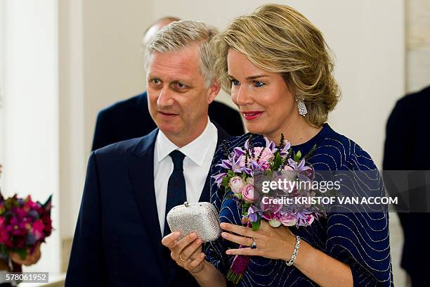 King Philippe of Belgium and Queen Mathilde of Belgium arrive for a concert by the Belgian National Orchestra on the eve of Belgium's National Day on...