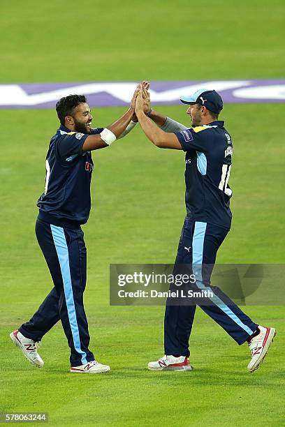 Azeem Rafiq and Tim Bresnan of Yorkshire Vikings celebrates the dismissal of Ryan Pringle of Durham Jets during the NatWest T20 Blast match between...