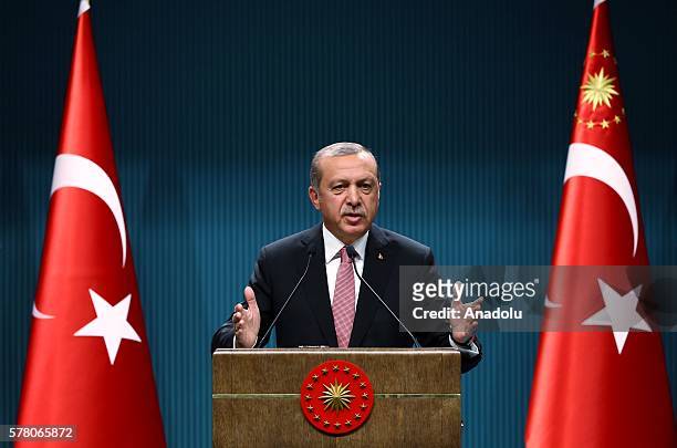 Turkish President Recep Tayyip Erdogan delivers a speech during a press conference after the National Security Council and Cabinet meetings at the...
