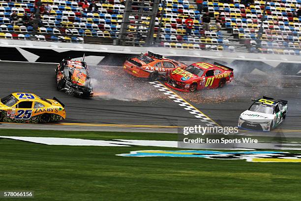 Carlos Contreras, Daniel Suarez, Landon Cassill, and Blake Koch wreck during driver qualifying for the NASCAR XFINITY Series - Alert Today Florida...