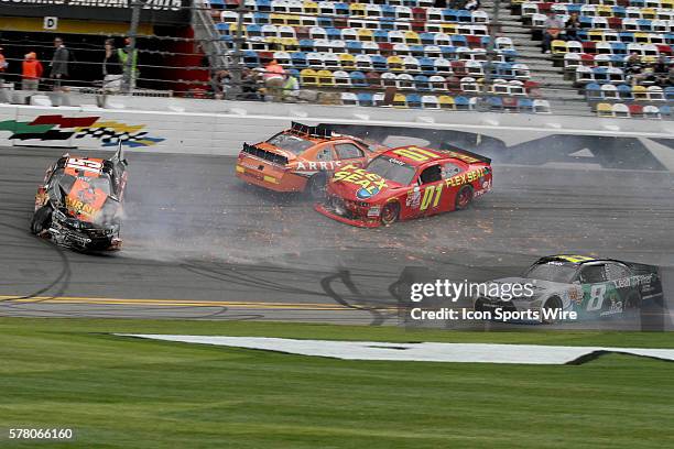 Carlos Contreras, Daniel Suarez, Landon Cassill, and Blake Koch wreck during driver qualifying for the NASCAR XFINITY Series - Alert Today Florida...