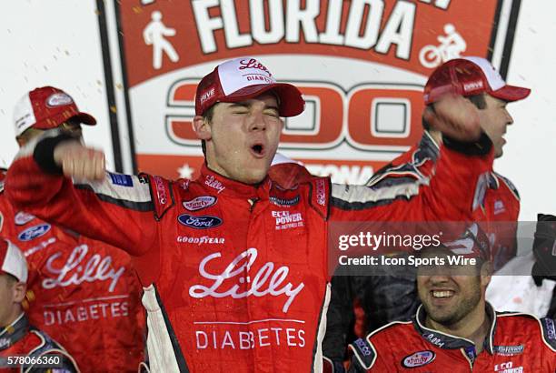 Ryan Reed celebrates winning the NASCAR Xfinity series Alert Today Florida 300 at Daytona International Speedway in Daytona, Florida