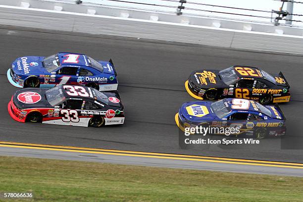 Austin Dillon, and Elliott Sadler lead Brendan Gaughan and Chase Elliott through turn 3 during the running of the NASCAR XFINITY Series - Alert Today...