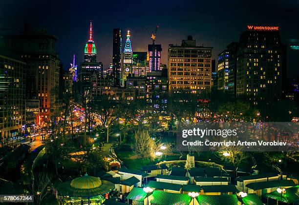 union square at night - new york city christmas stock pictures, royalty-free photos & images