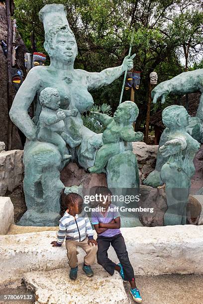 South Africa Johannesburg Soweto Kwa-Khaya Lendaba Credo Mutwa Cultural Village sculptures boy.