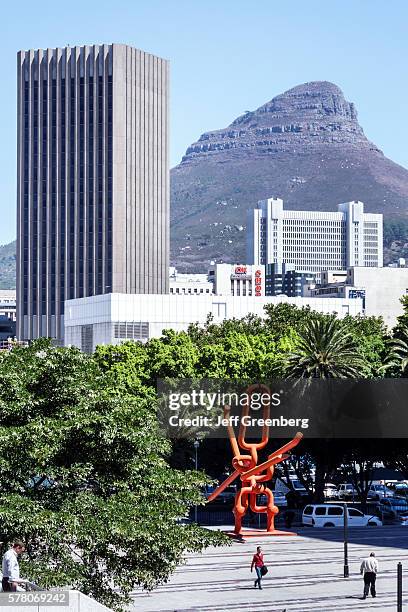 South Africa, Cape Town, City Centre, skyline and Signal Hill sculpture.