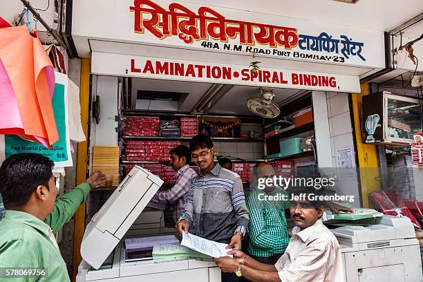 India Indian Mumbai Fort Mumbai Kala Ghoda Nagindas Master Road sidewalk street vendor stall shopping lamination spiral binding photocopier office...