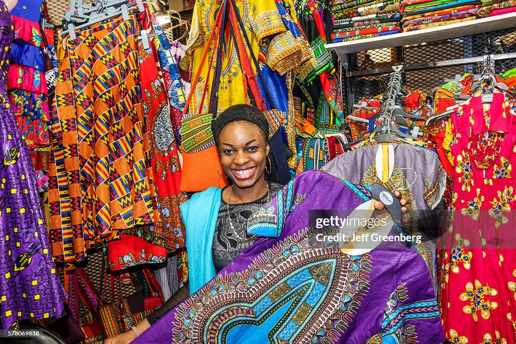 Rosebank Mall Flea Market, vendor stall couple looking at dashiki gown