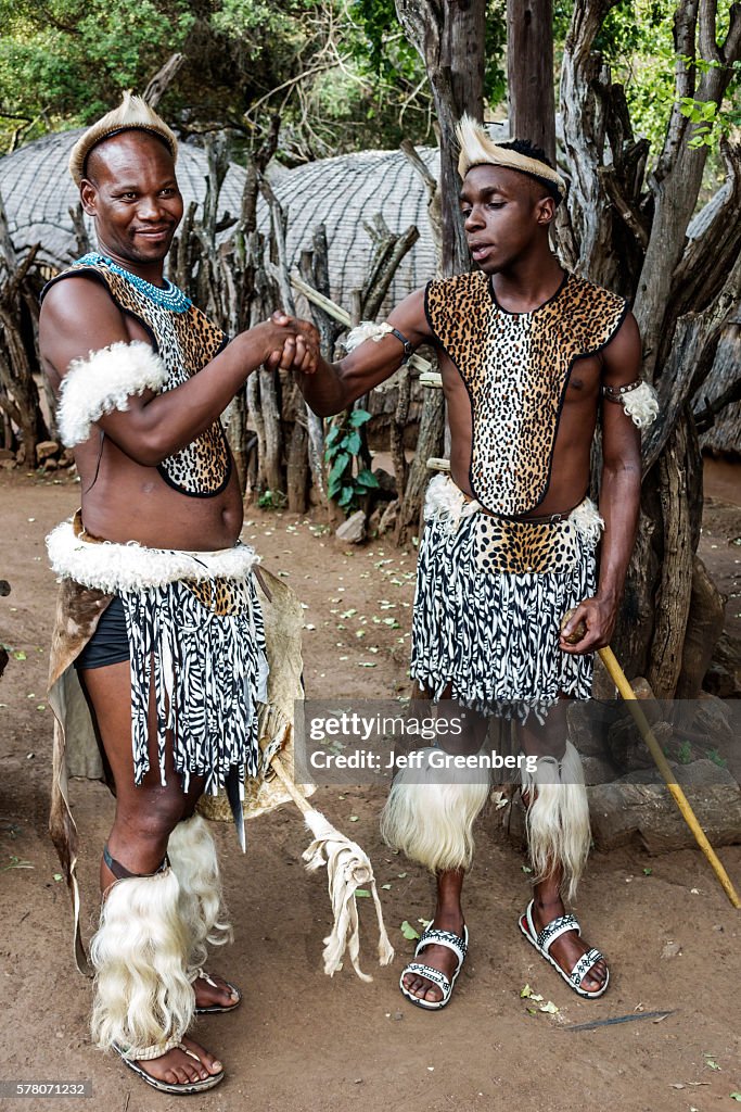 Lesedi Lodge & Cultural Village, man traditional clothing tribal village greeting handshake