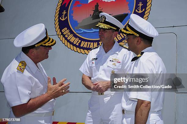 Turkish Naval Fleet Commander Admiral Nusret Guner, left, talks to Chief of Naval Operations CNO Admiral Jonathan Greenert aboard the Turkish navy...